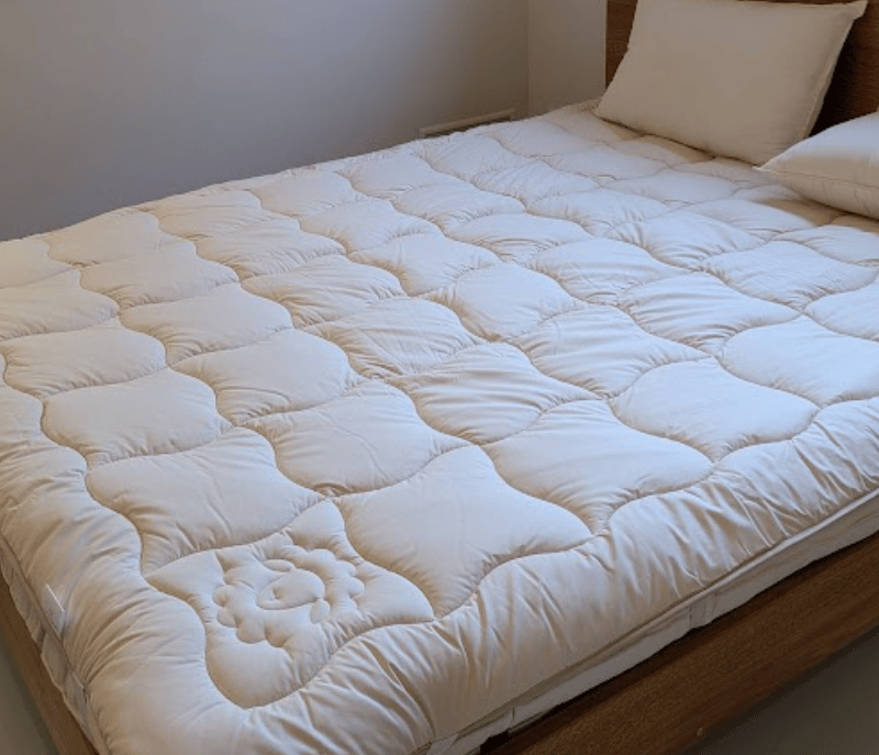Surmatelas Fin en laine naturelle